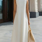 Asymmetric High-Neck Flowing A-Line Maxi Dress