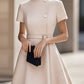 Elegant Black High-Neck Dress with Belted Waist