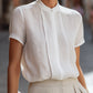 Structured Short Sleeve Stand Collar Blouse With Pleated Front Panel