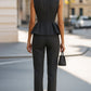 Sophisticated Sleeveless Peplum Jumpsuit In Charcoal Gray