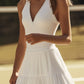 Elegant White V-Neck Tennis Dress with Layered Skirt