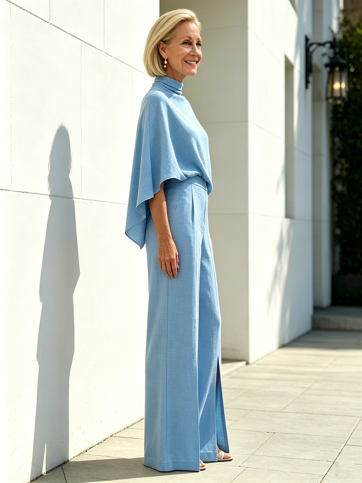 Solid Color 2 Piece Outfit Set, Semi High Mock Neck Cape Sleeve Blouse, High Waist Split Wide Leg Pants, Light Textured Woven Fabric, Relaxed Elegant Silhouette, Flowy Cape Top and Front Slit Trousers for Formal and Semi-formal Occasions