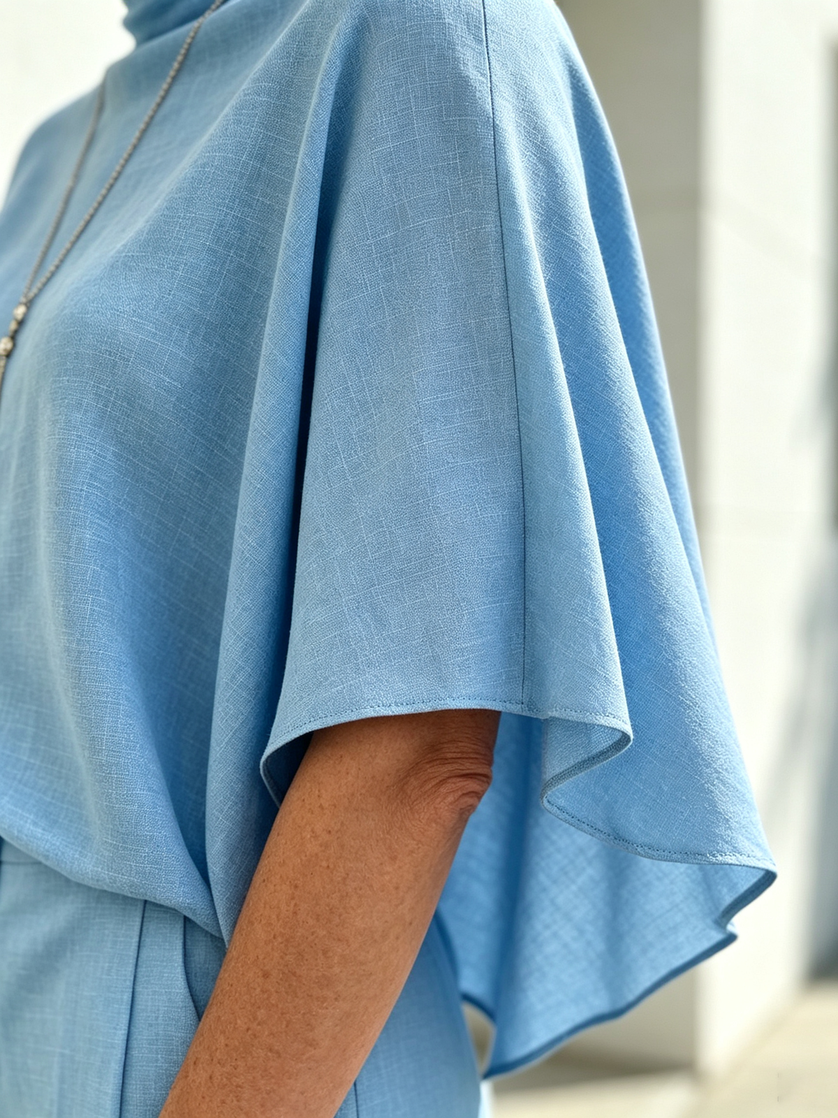 Solid Color 2 Piece Outfit Set, Semi High Mock Neck Cape Sleeve Blouse, High Waist Split Wide Leg Pants, Light Textured Woven Fabric, Relaxed Elegant Silhouette, Flowy Cape Top and Front Slit Trousers for Formal and Semi-formal Occasions