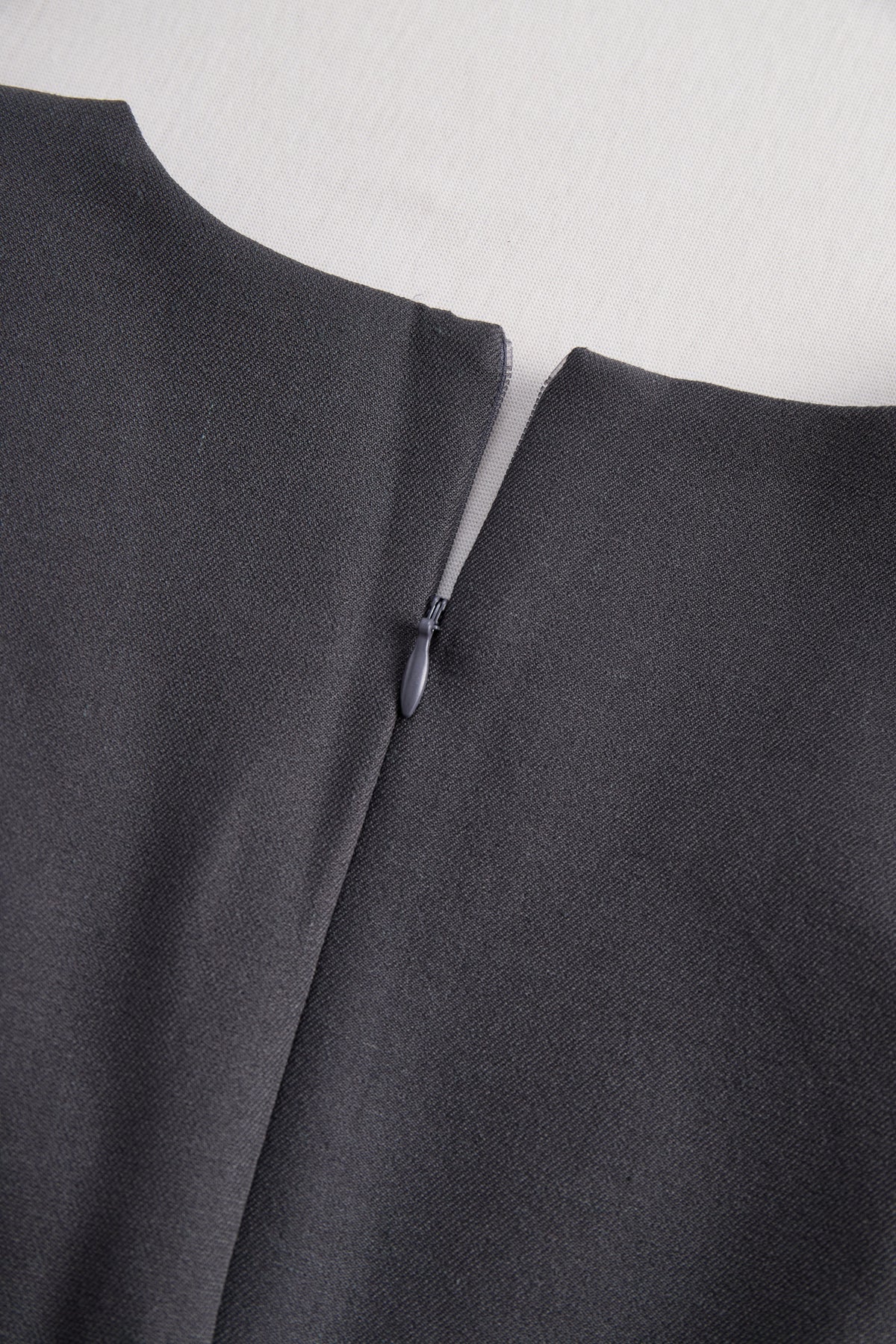 Sophisticated Sleeveless Peplum Jumpsuit In Charcoal Gray