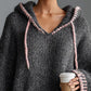 Loose-fitting hooded pink-trimmed knitted mini dress