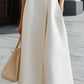 Asymmetric High-Neck Flowing A-Line Maxi Dress