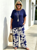 Elegant Two‐Piece Casual Suit for Women, Loose Solid Short Sleeve Top and High Waist Floral Printed Wide Leg Pants, Comfortable Relaxed Fit Co‐Ord Outfit, Fashionable Loungewear for Summer Daily Holiday Occasions